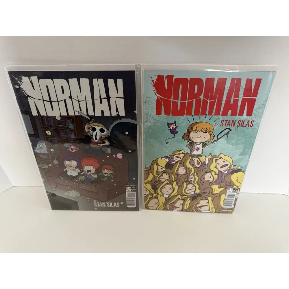 Norman Comics Lot Of 2 Books